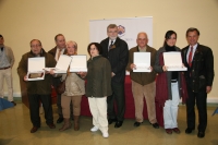 Los homenajeados, junto al rector y directivos universitarios