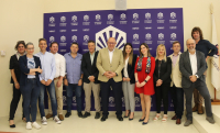 Representantes académicos y de GECA tras la firma del convenio.